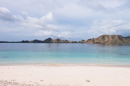 Beautiful beach on a sunny day in Flores, Indonesiaの写真素材