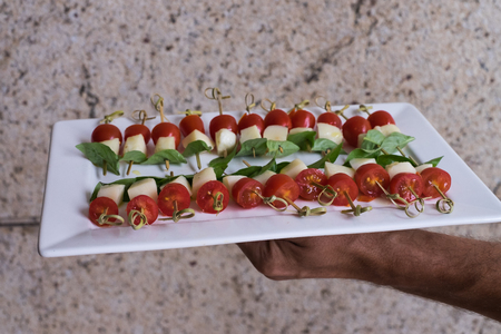 Plate of caprese salad being served in Rio de Janeiro, Brazilの写真素材