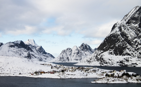 Beautiful snow covered landscape with high peaks in Lofoten Island, Norwayの写真素材