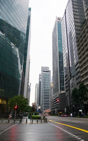 Abstract shot of skyscrapers in Singapore on a cloudy dayのeditorial素材