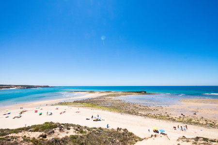 Turquoise water on the uncrowded beaches of Sagres in Algarve, Portugalの写真素材
