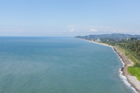 Beautiful Scenic Summer View From Botanical Garden Of Sea Bay And Railroad On Coast. The Lush Green Vegetation Of Summer. Sunny Day. Batumi, Adjara Georgiaの写真素材