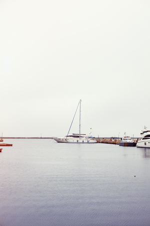 luxury yachts parked in a bay on the seaの写真素材