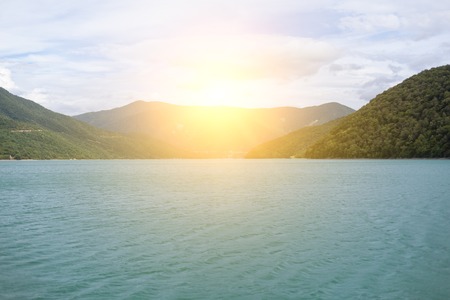Majestic mountain lake in Georgia. Evening degore the rainの写真素材