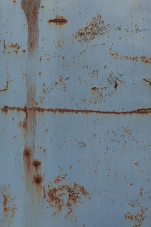 A rusty blue corrugated iron metal texture.の写真素材