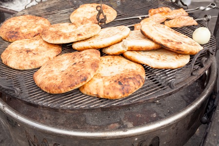 Pita, Arabic bread, soft baked flatbreads on grillの写真素材