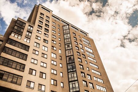 Modern, Luxury Apartment Building with clody blue sky on the backgroundの写真素材