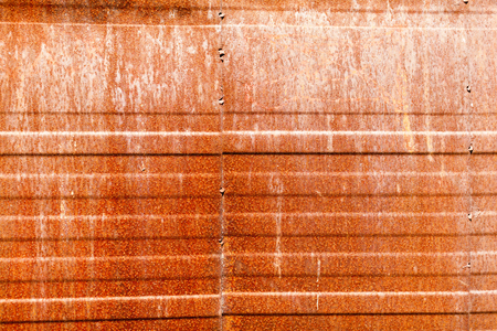 Rusty metal wall background with horizontal linesの写真素材