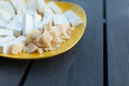 Cheese Assortment on a dark background, selective focus Close upの写真素材