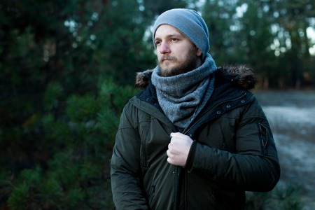 Handsome man or lumberjack, bearded hipster, with beard and moustache outdoors on natural backgroundの写真素材