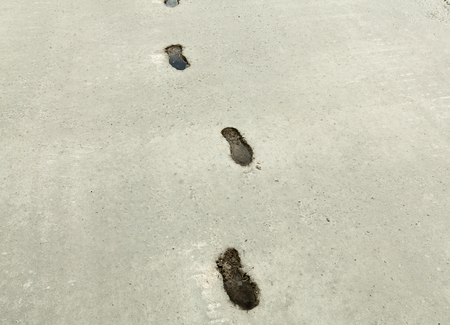 Shoe footprint on concrete surface abstract backgroundの写真素材