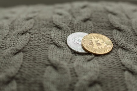 bitcoin coin on a wool background close upの写真素材