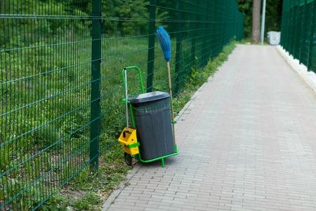 cleaning equipment, broom and bin trash for waste cleaning in the parkの写真素材
