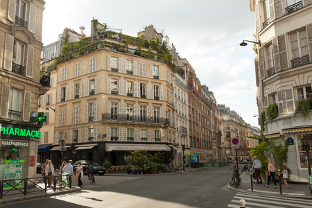 Paris, France 02 June 2018 Streets of the central district of the city of Paris in the summer. Passers-by and tourists with cameras walk around the cityのeditorial素材