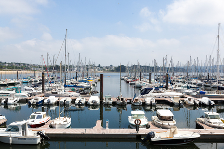 Brest, France 28 May 2018 Panoramic outdoor view of sete marina .Many small boats and yachts aligned in the port. Calm water and blue cloudy skyのeditorial素材