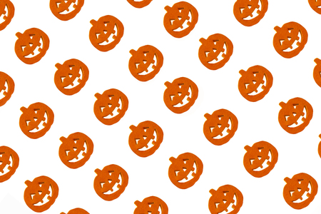 Orange halloween pumpkins on the white background Isolated. paper for wrappingの写真素材
