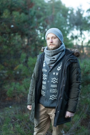 Handsome man or lumberjack, bearded hipster, with beard and moustache outdoors on natural backgroundの写真素材