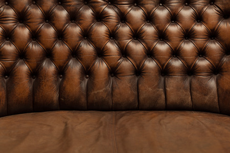 luxury brown leather sofa background texture close upの写真素材