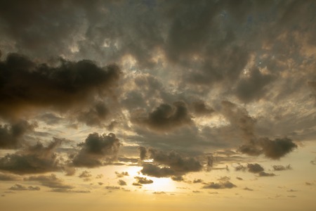 Fantastic sky, dramatic sunset, beautiful natural background. Setting sun illuminates the clouds