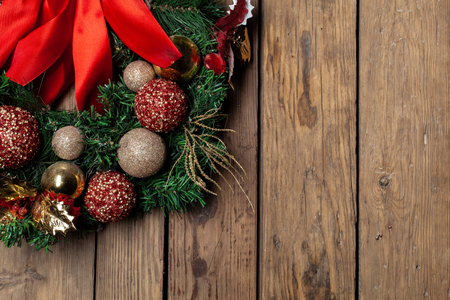 Christmas wreath. Winter holidays tradition, Jingle bells,Light garland , Holly berry, Candy cane ,top viewの写真素材