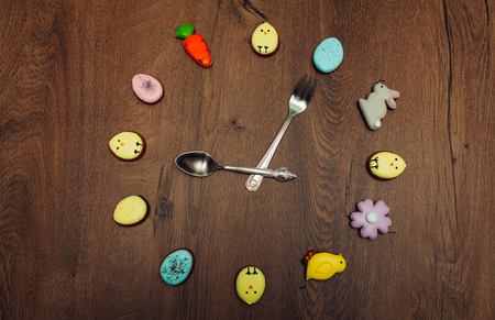 Easter homemade gingerbread cookie clock face backgroundの写真素材