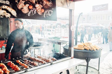 Ukraine, Kharkov 30 December 2018 Christmas market. New Year's Fair. Winter street food. Holidays and weekends in the city. Family Leisure.のeditorial素材
