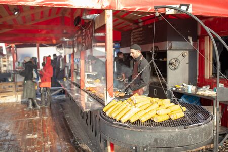 Ukraine, Kharkov 30 December 2018 Christmas market. New Year's Fair. Winter street food. Holidays and weekends in the city. Family Leisure.のeditorial素材