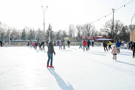 Ukraine, Kharkov 30 December 2018 People skate in the city park on Freedom Square. Excellent family leisure on weekends and holidaysのeditorial素材