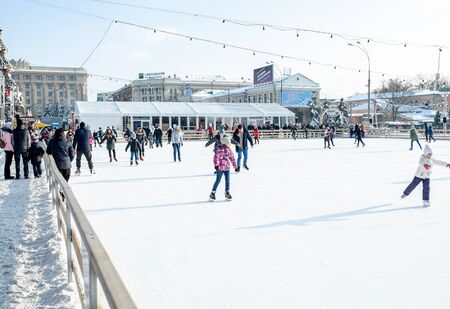 Ukraine, Kharkov 30 December 2018 People skate in the city park on Freedom Square. Excellent family leisure on weekends and holidaysのeditorial素材