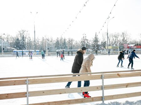Ukraine, Kharkov 30 December 2018 People skate in the city park on Freedom Square. Excellent family leisure on weekends and holidaysのeditorial素材