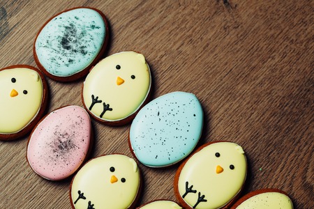 Easter homemade gingerbread cookie over tablecloth close upの写真素材