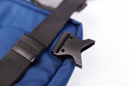 Black side release acculoc buckle plastic clasp, quick nylon belt rope lock strap, isolated macro...