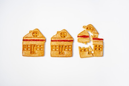 Mortgage house concept. Sweet dessert. Investment insurance business. Sweet background. Property family home insurance protection.の写真素材