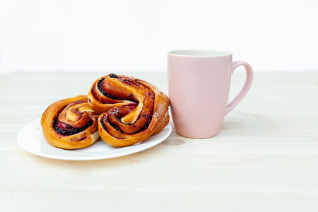Rustic with black current berry filling pie on white wooden table background. Tasty breakfast. Bakery Fresh Healthy breakfast. Unhealthy food with glutenの写真素材