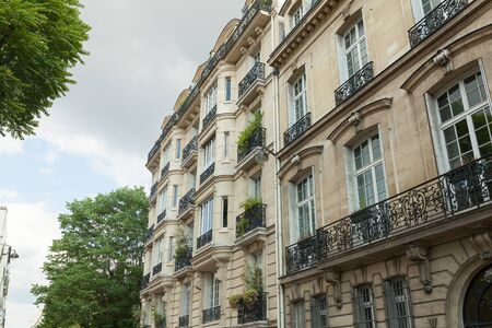 Paris, France 02 June 2018 houses emerged in the green of plants, trees, and flowersのeditorial素材