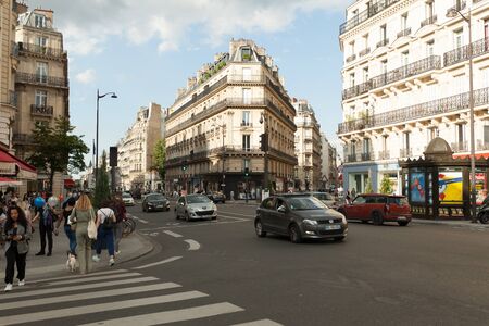 Paris, France 02 June 2018 Streets of the central district of the city of Paris in the summer. Passers-by and tourists with cameras walk around the cityのeditorial素材