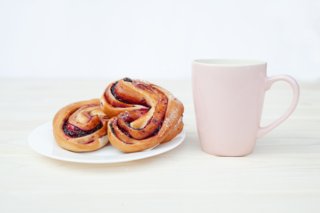 Rustic with black current berry filling pie on white wooden table background. Tasty breakfast. Bakery Fresh Healthy breakfast. Unhealthy food with glutenの写真素材