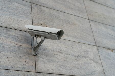 CCTV cameras are installed along the streets. To check traffic conditions and take care of safety Big brother is watching you conceptの写真素材