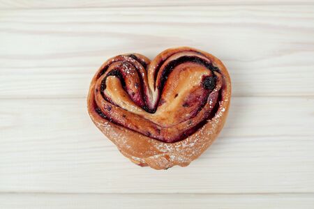 Rustic with black current berry filling pie on white wooden table background. Tasty breakfast. Bakery Fresh Healthy breakfast. Unhealthy food with glutenの写真素材