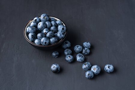 Blueberry antioxidant organic superfood in a bowl concept for healthy eating and dieting nutrition Top view. の写真素材