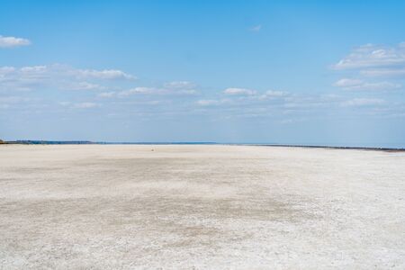 Dry sea endless sand beautiful clouds beautiful landscape estuary. Azove seaの写真素材