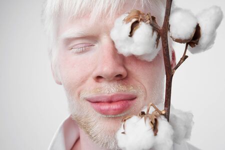 Happy smile albino man white skin hair soft fluffy cotton brunch studio dressed t-shirt isolated...