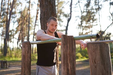 Handsome caucasian men push up outdoor workout cross training morning Pumping triceps arm exercising...