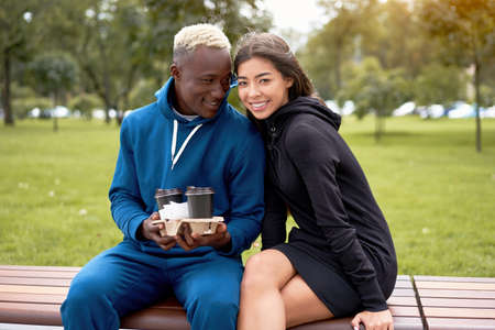 African american man proposes coffee asian woman Multiethnic friendship. Interracial relationship...