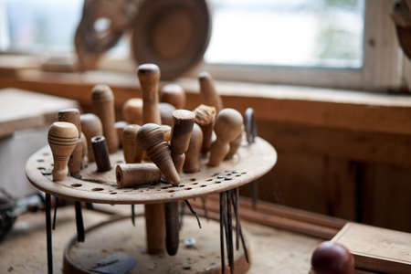 Wood carving tool Carpenter tools in stand at workplace Handmade woodworking instrument for woodwork hobbyの写真素材