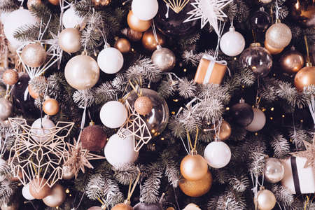 Christmas tree decoration close up background. Garland, balls, illuminated lights. Merry Christmas and Happy New yearの写真素材