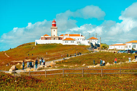 Portugal, Sintra, May 2022 View of the Cabo da Roca Lighthouse. Sintra, Portugal. Portuguese Farol de Cabo da Roca is a cape which forms the westernmost point Eurasian land mass. Sunny summer dayのeditorial素材