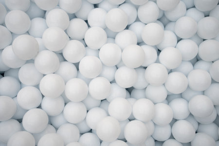 Many white plastic balls for dry pool in amusement parkの写真素材
