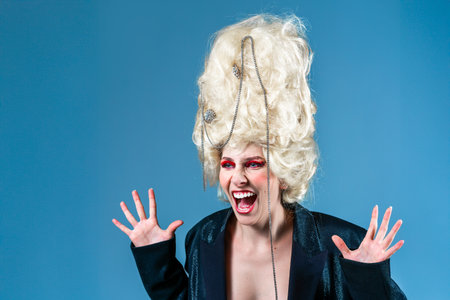 Weird yelling princess, queen wearing black jacket, and vintage royal wig with red makeup scream...