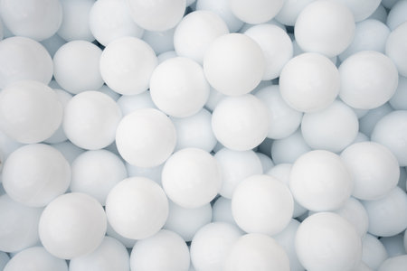 Many white plastic balls for dry pool in amusement parkの写真素材